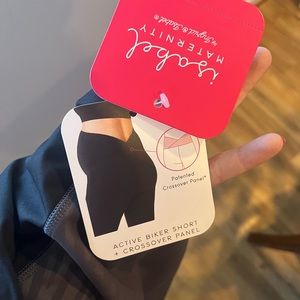 Isabel maternity biker shirt size large, dark grey zebra print. NWT